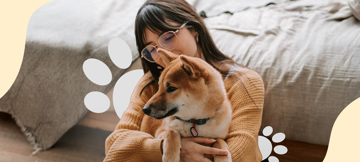 Woman holding a dog