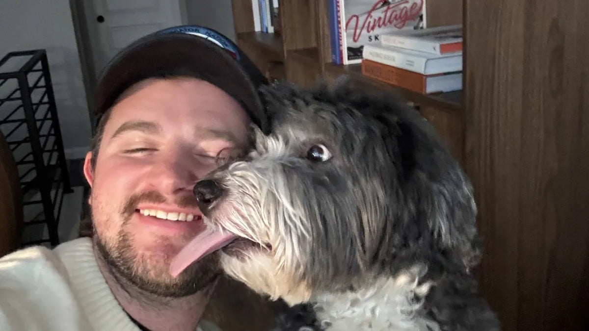 Tanner and Winston, a Bernedoodle, taking a selfie